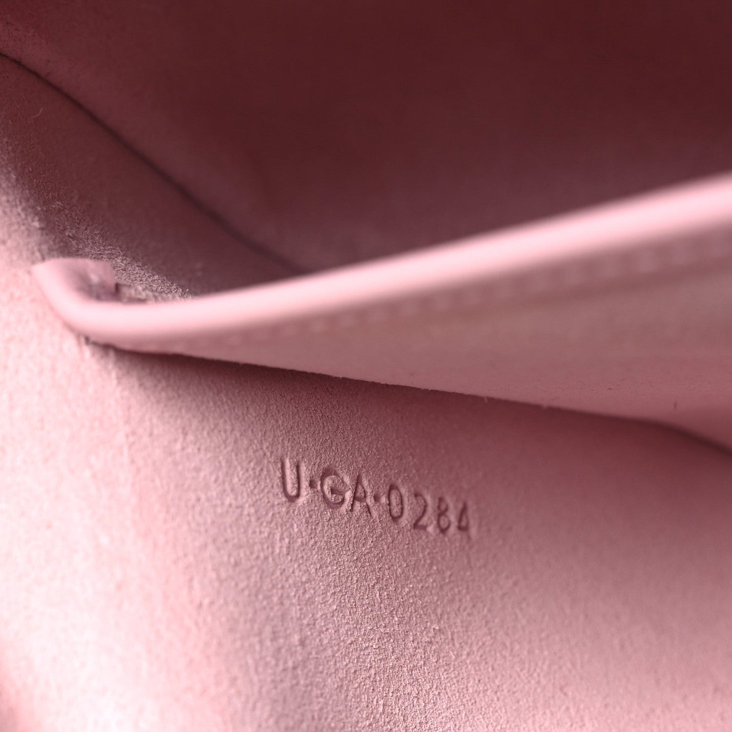 Celine smooth calfskin interior stamp “U-GA10284” on pastel pink lining