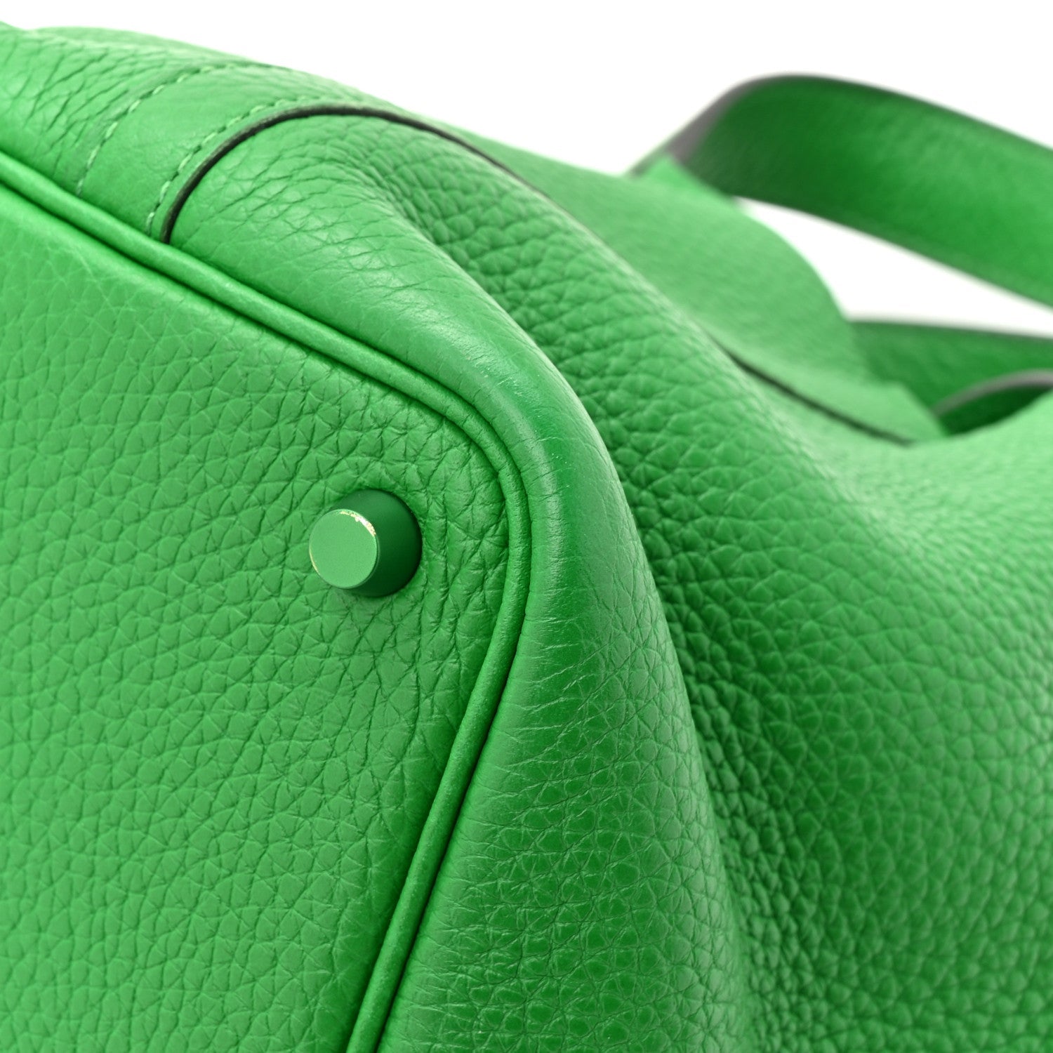 Green leather Picotin Lock 18 PM tote bag close-up of pebbled texture and lock knob