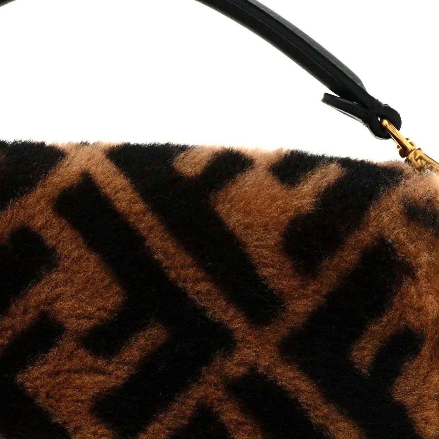 Shearling FF logo top edge with black handle strap and gold clasp hardware.