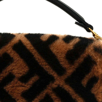 Shearling FF logo top edge with black handle strap and gold clasp hardware.
