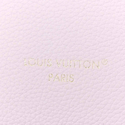 Embossed “Louis Vuitton Paris” on pale lilac leather surface