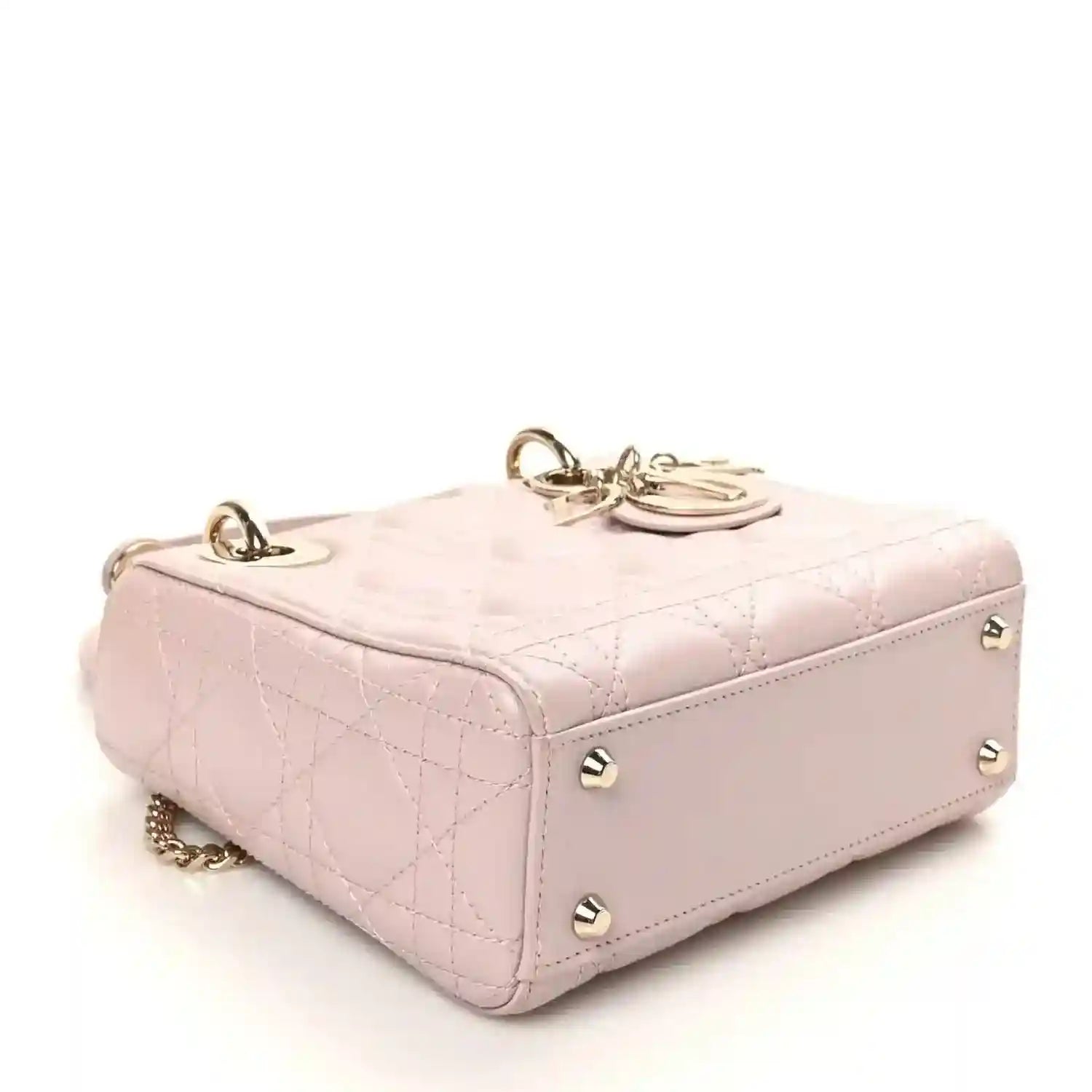 Mini Lady Dior handbag in rose pink lambskin with gold hardware and diamond quilting, top view