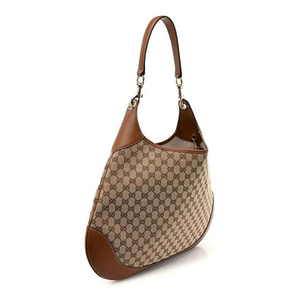 GG monogram canvas hobo shoulder bag with brown leather trim and gold-tone hardware