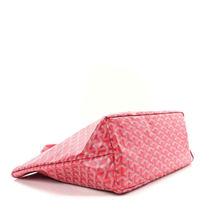 Fuchsia patterned tote bag folded flat, showing bottom edge and side seam