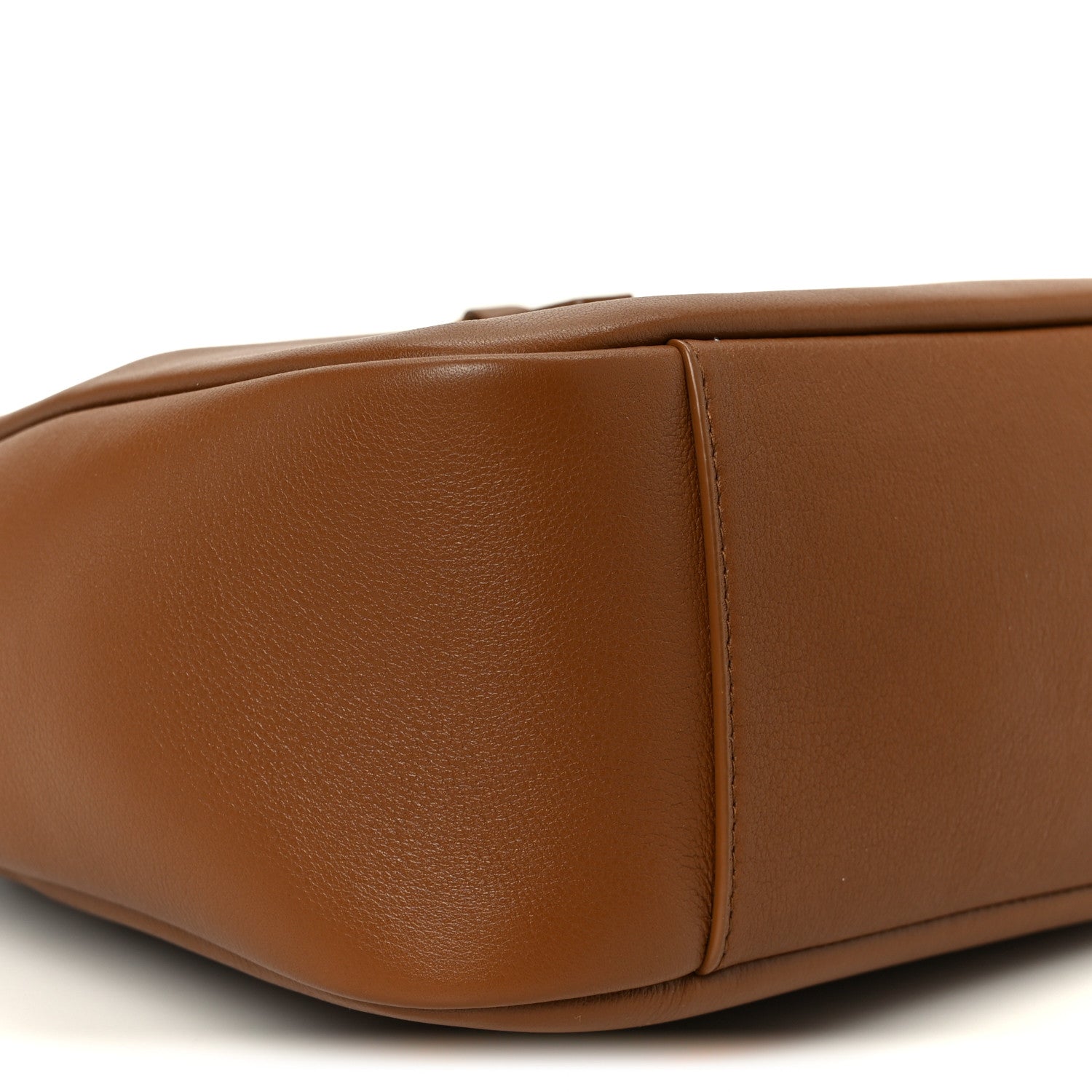 Saint Laurent hobo bag close-up of smooth brown leather side with panel seam