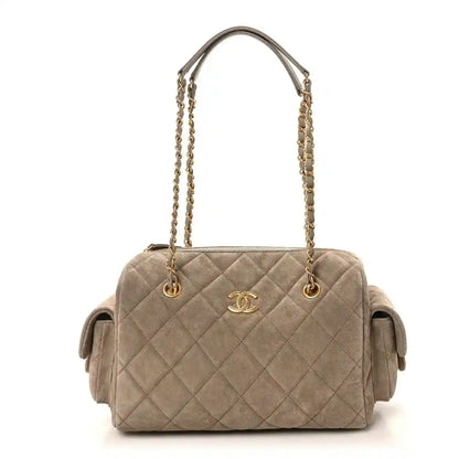 Chanel dark grey quilted suede bowling bag with gold chain handles and snap pockets