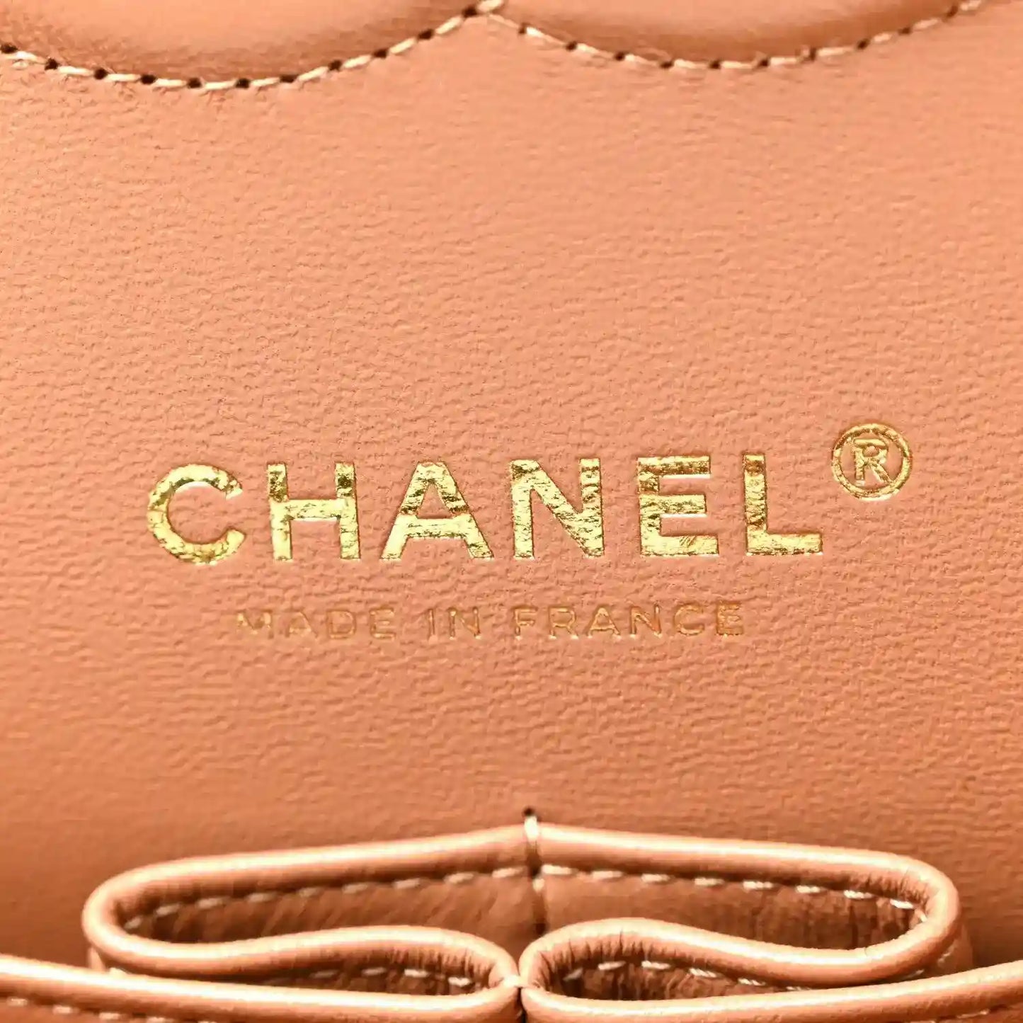 Chanel quilted lambskin bag front logo on tan-brown leather with stitched edge