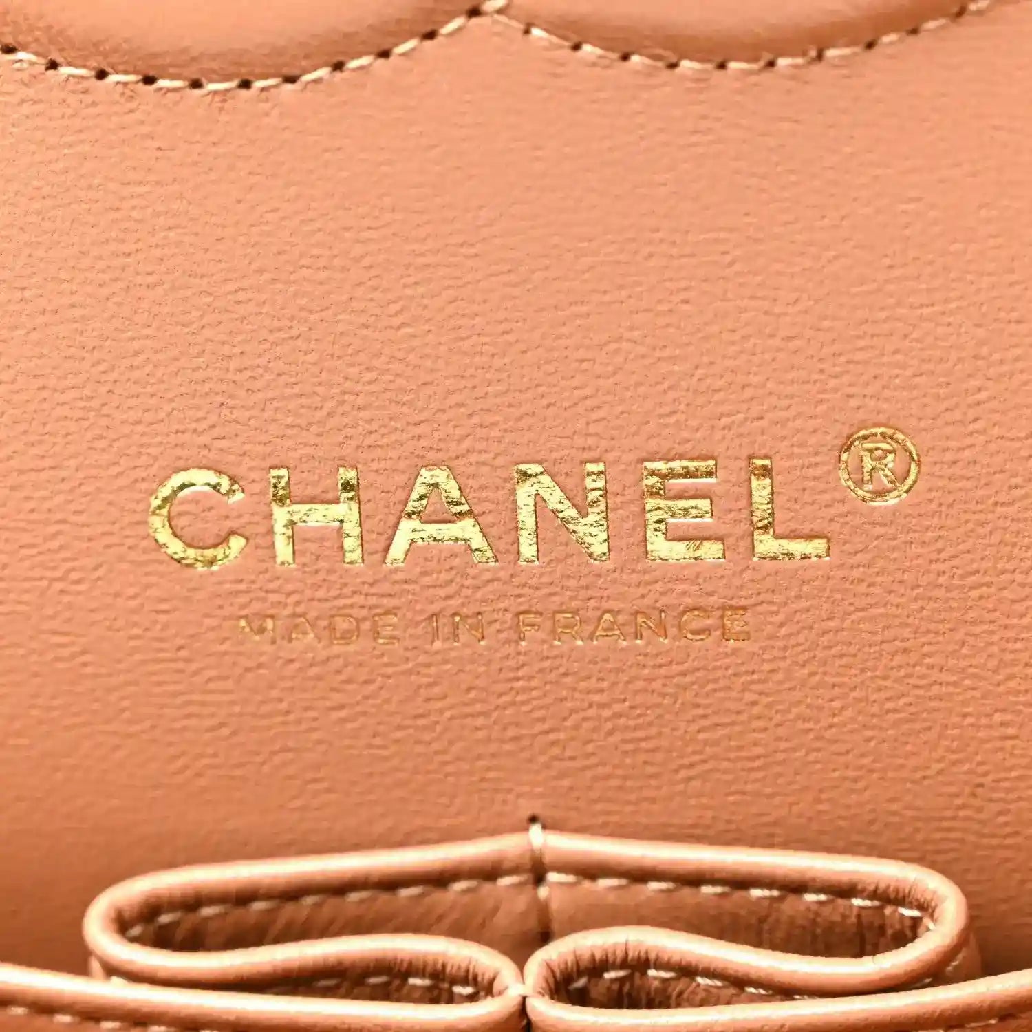 Chanel quilted lambskin bag front logo on tan-brown leather with stitched edge