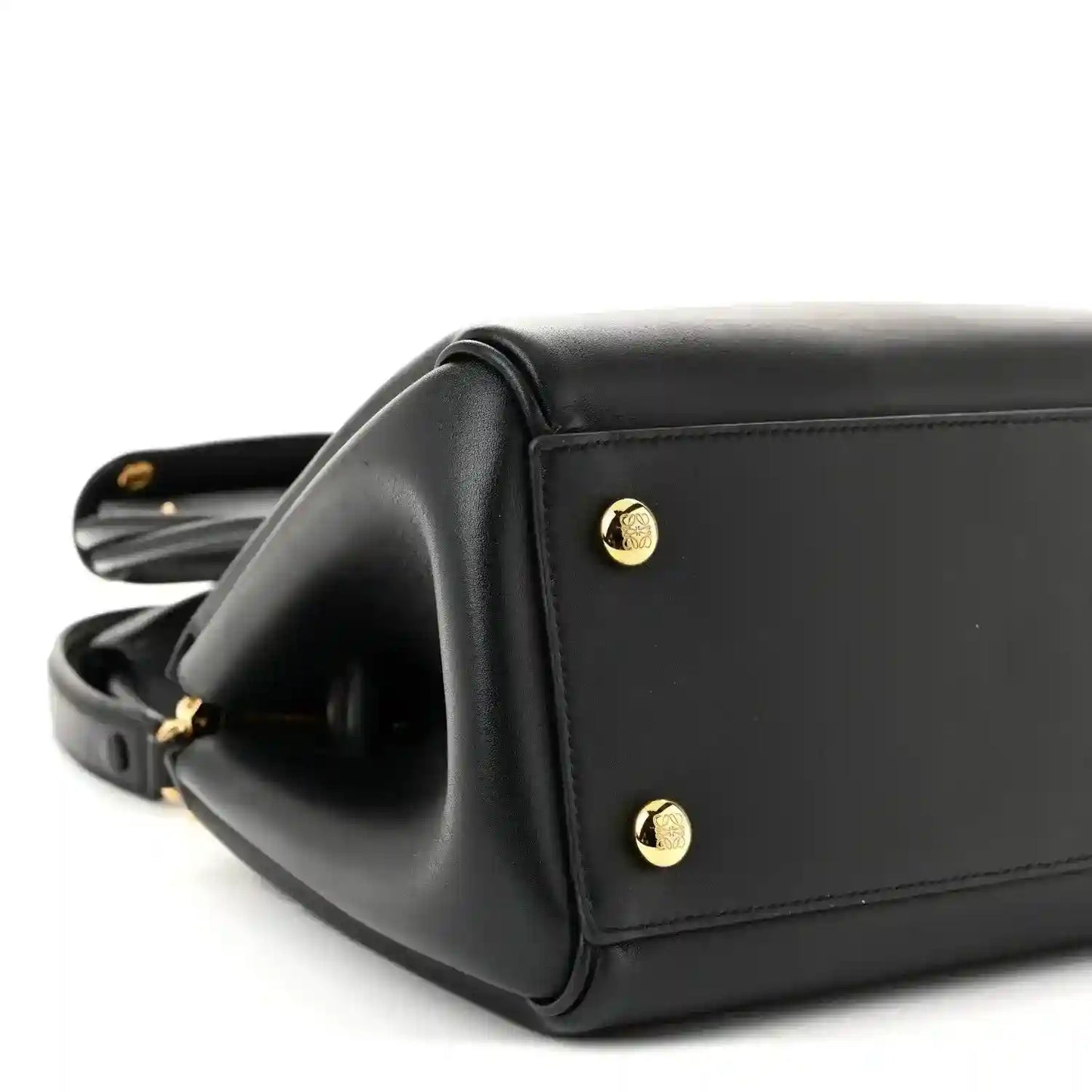 Black Small Madrid bag side panel with gold-tone studs and structured top edge.