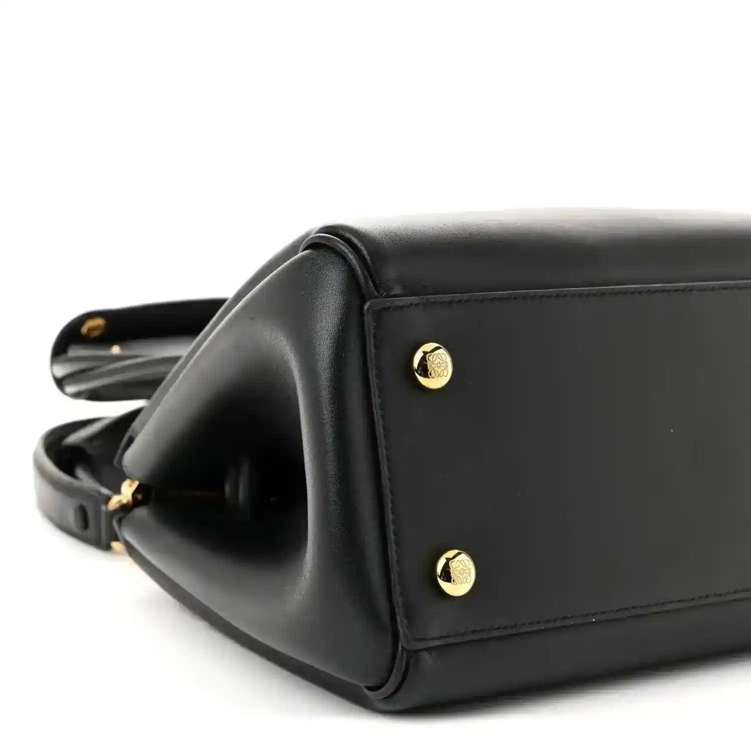 Black Small Madrid bag side panel with gold-tone studs and structured top edge.