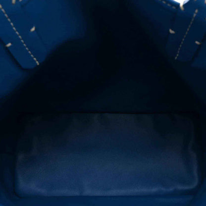 Sky blue tote bag interior with smooth lining and stitched edge seams