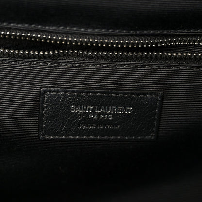 Black fabric lining inside satchel with SAINT LAURENT PARIS label