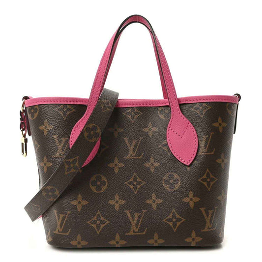 Louis Vuitton monogram tote bag with pink leather top handles and wrist strap