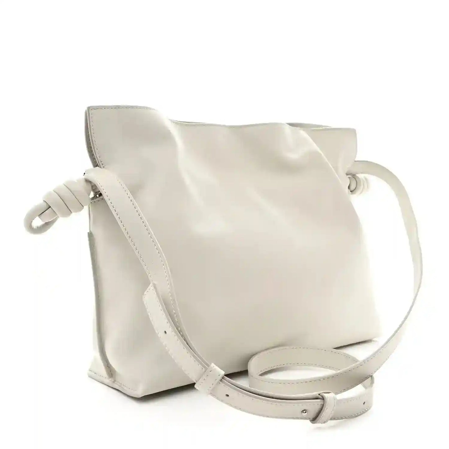 Knot clutch with pale grey leather finish and adjustable crossbody strap
