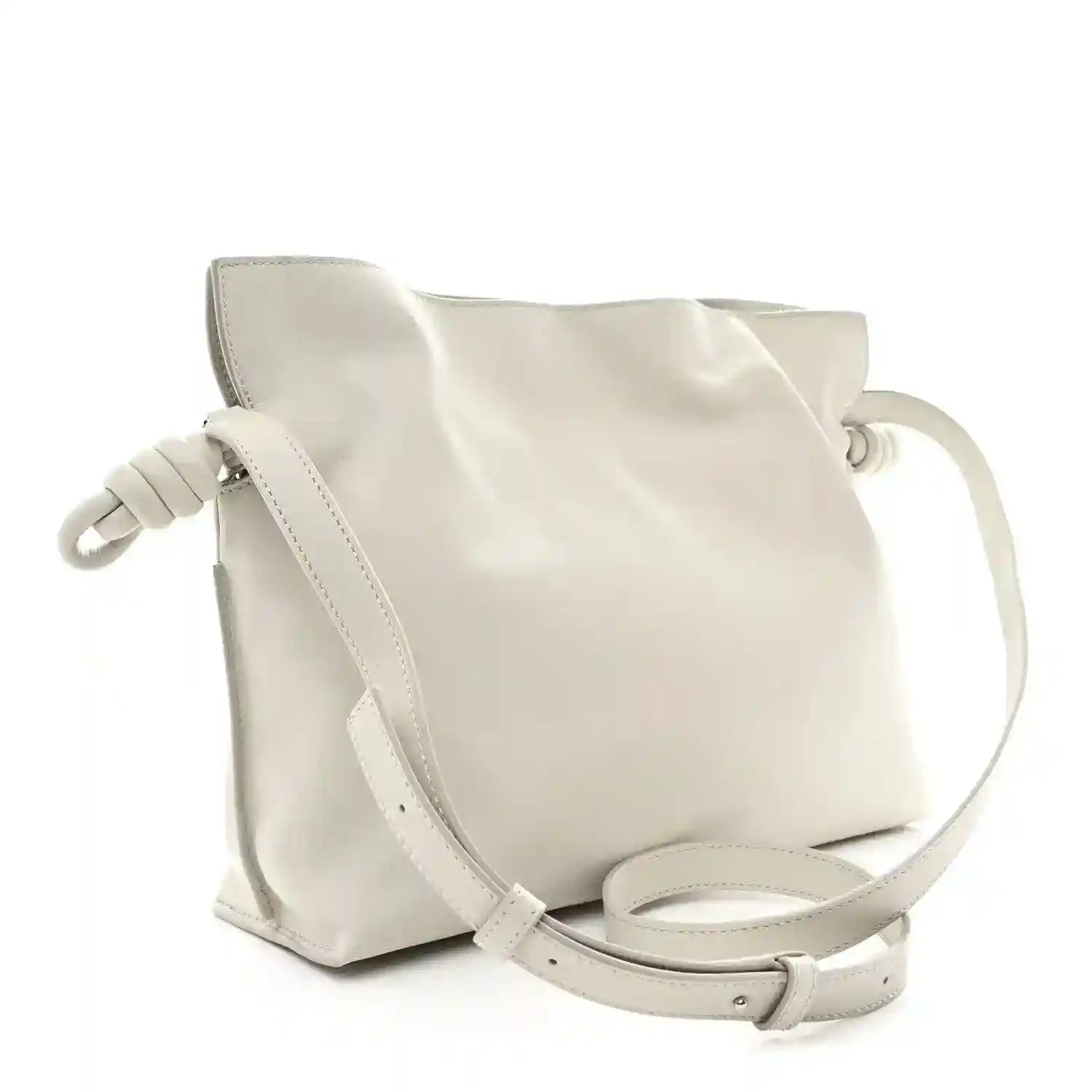Knot clutch with pale grey leather finish and adjustable crossbody strap