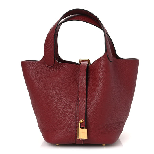 Burgundy leather mini tote with gold-tone lock and dual top handles