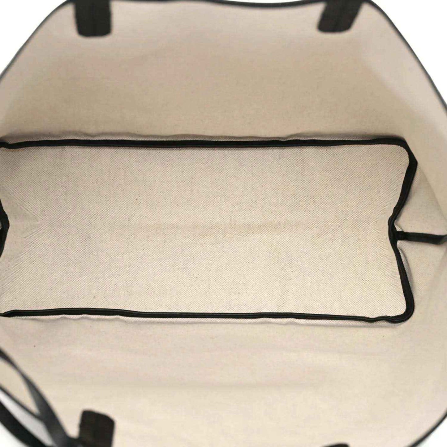 Tote bag interior lining with black edge trim on coated canvas