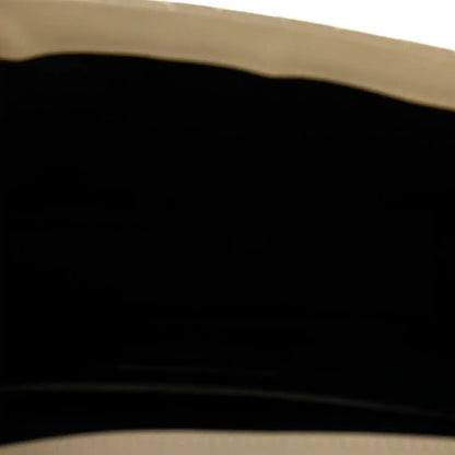 Black leather satchel interior lining close-up