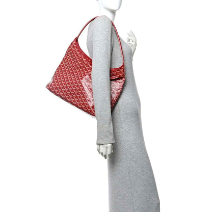 Red Goyardine hobo bag with removable pouch and top handle, monogram pattern