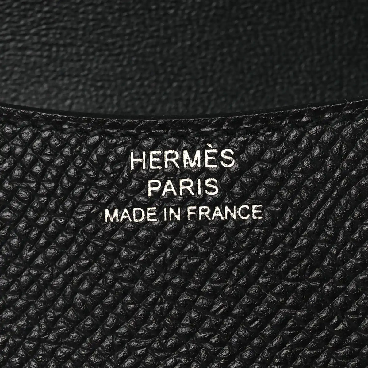 Black leather wallet lining with HERMÈS PARIS MADE IN FRANCE text