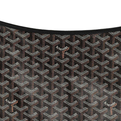 Close-up of Goyard hobo bag coated canvas with repeating Goyardine pattern and logos