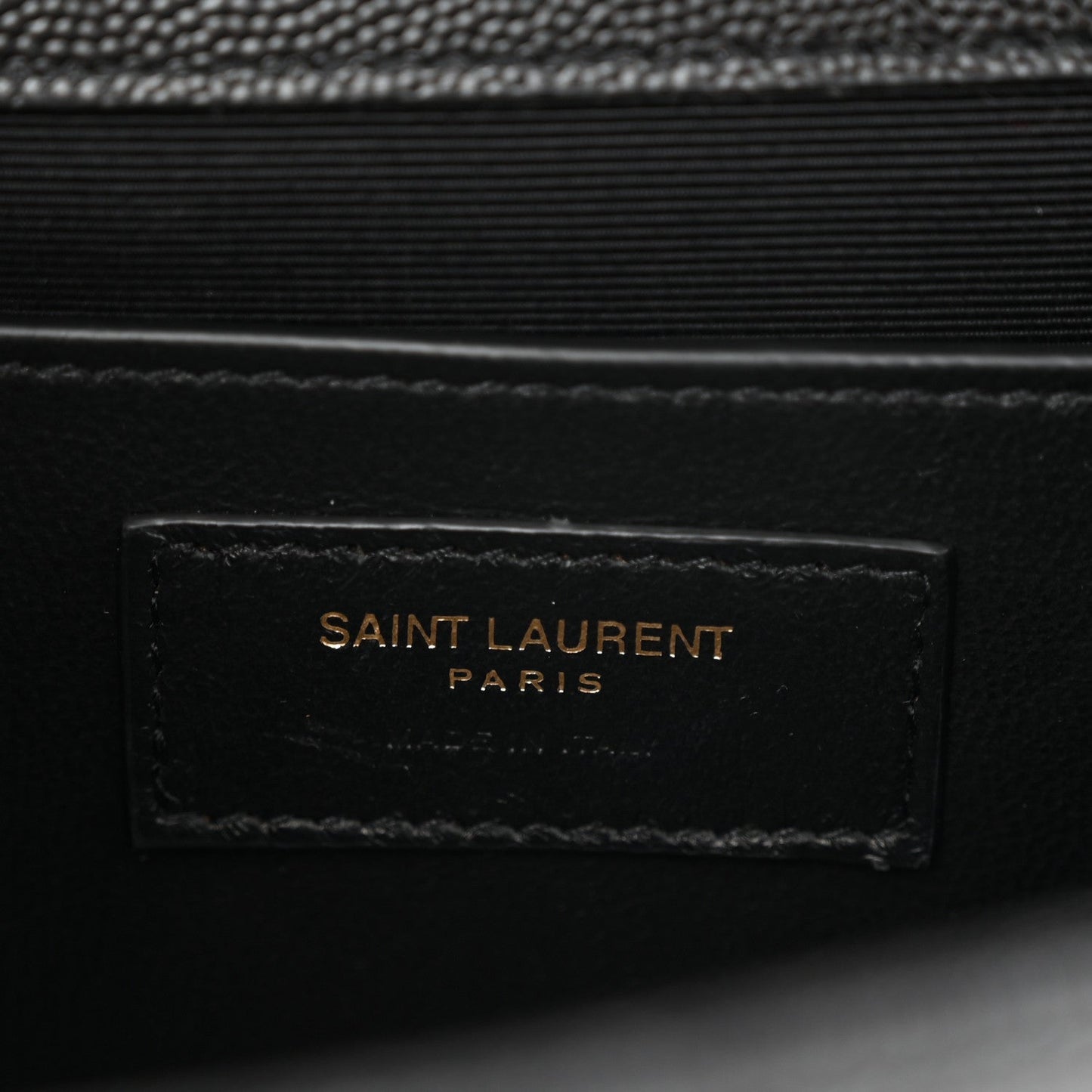 Black leather satchel with SAINT LAURENT PARIS logo plaque