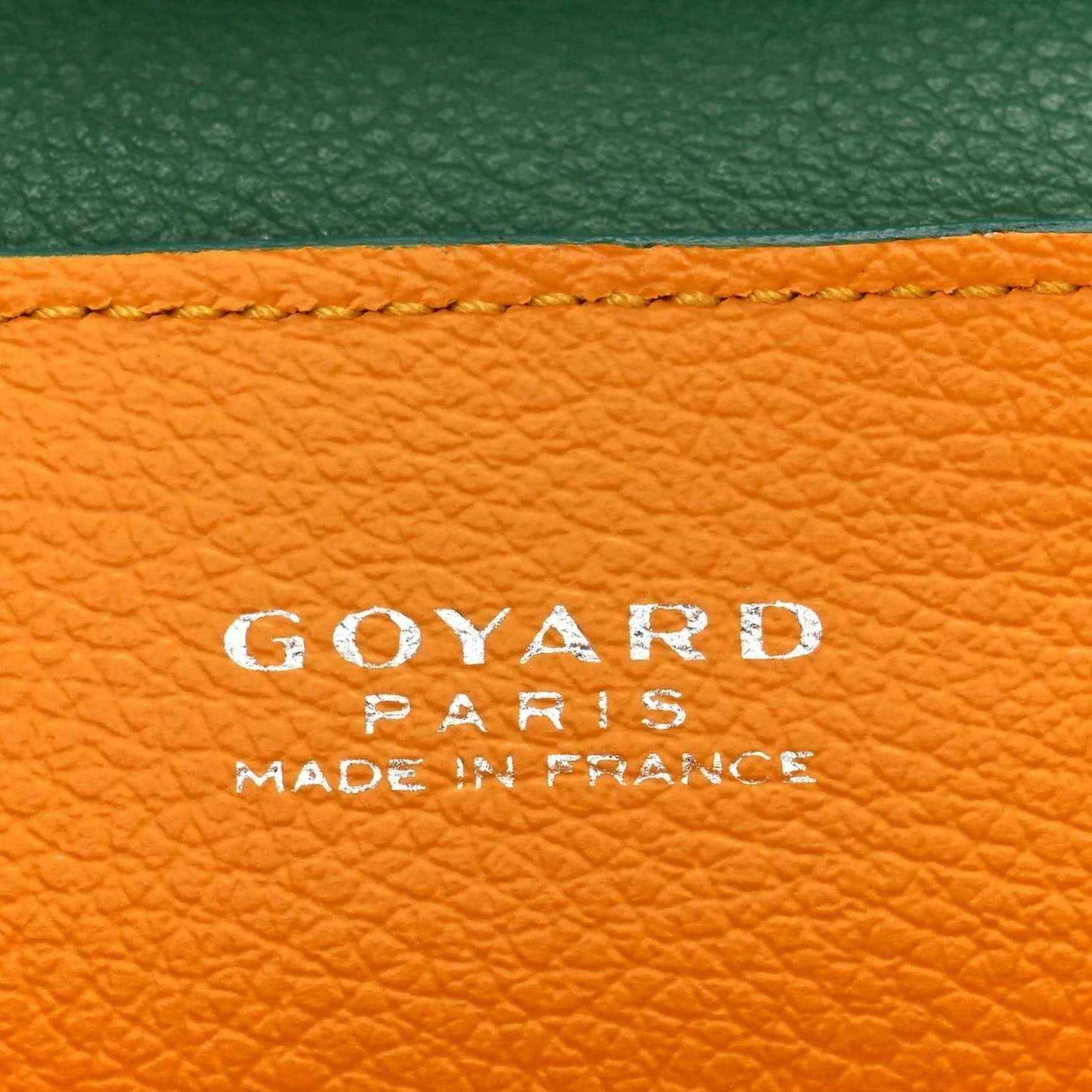 Goyard stamp on orange lining inside the green mini Saigon bag
