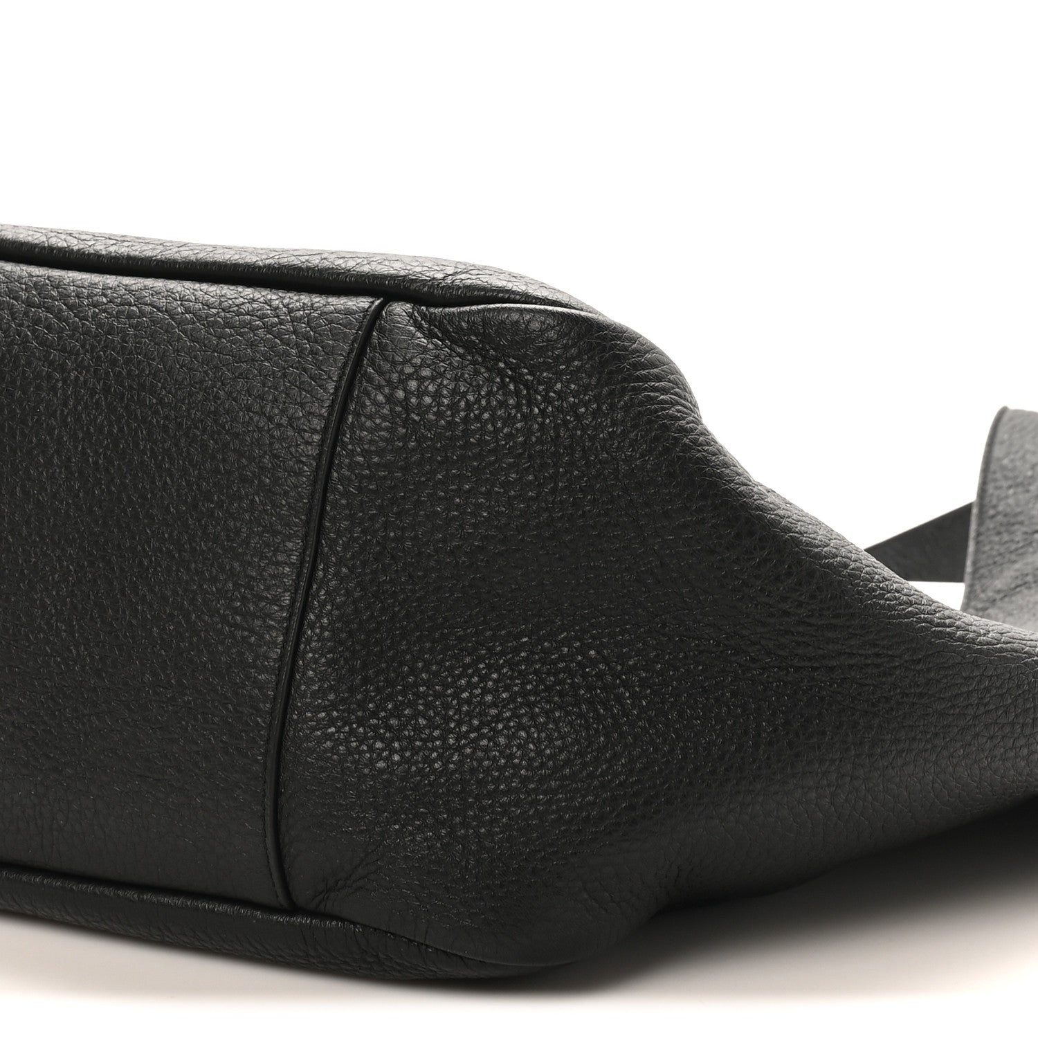 Black grained deerskin tote bottom corner with smooth edge stitching and seam