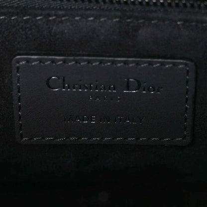 Christian Dior leather handbag label reading “MADE IN ITALY”