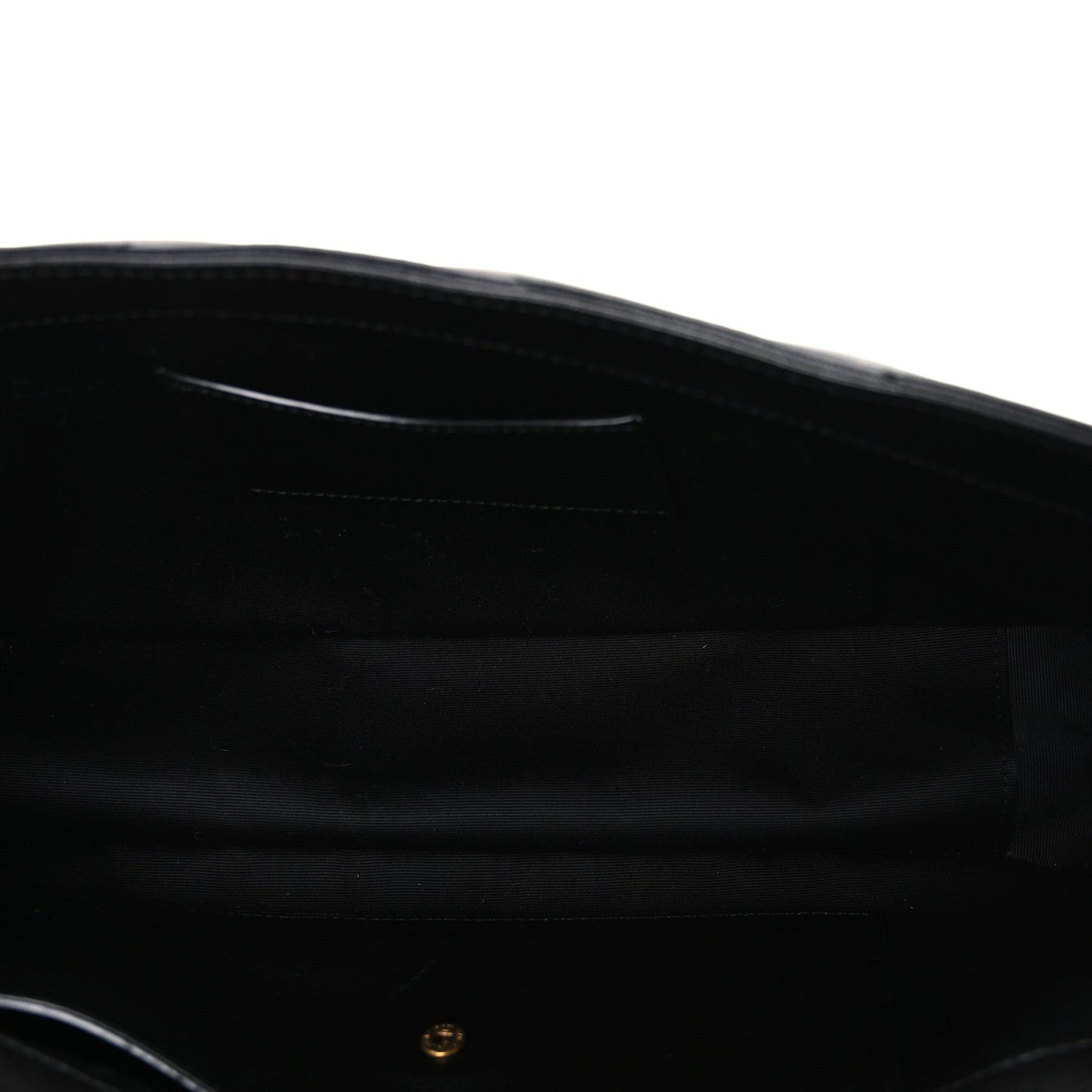 Black leather shoulder bag interior with stitched trim and small gold hardware