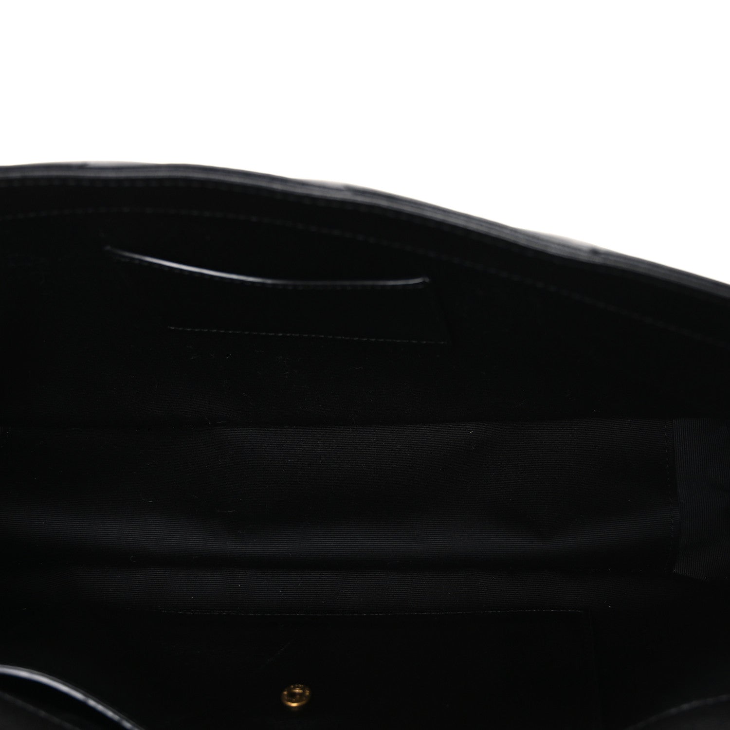 Black leather shoulder bag interior with stitched trim and small gold hardware