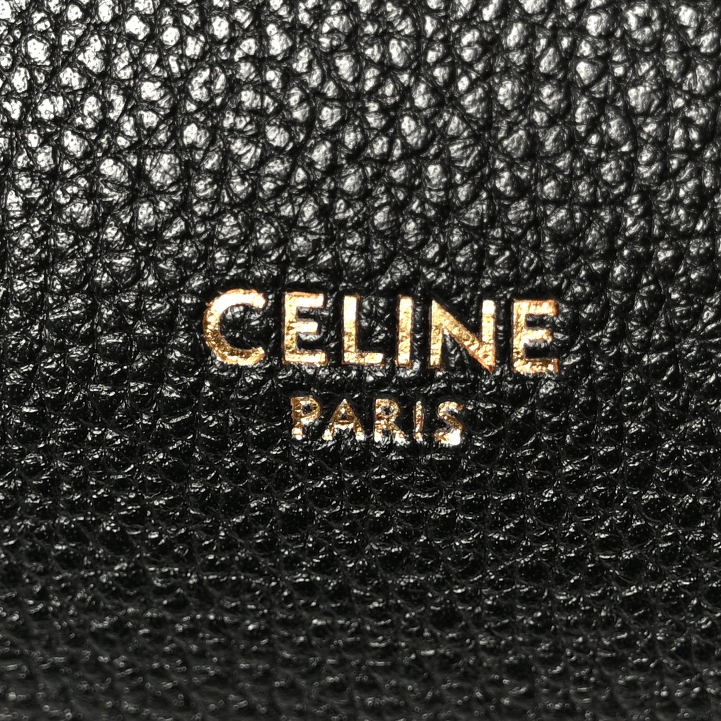 Celine Paris logo on black grained leather