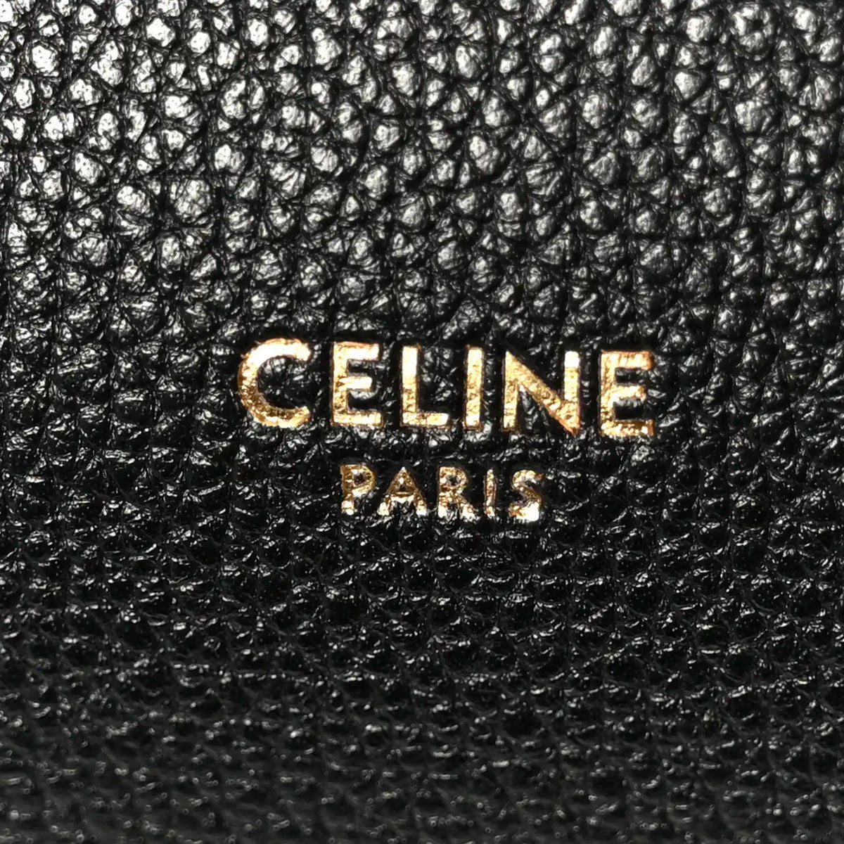 Celine Paris logo on black grained leather