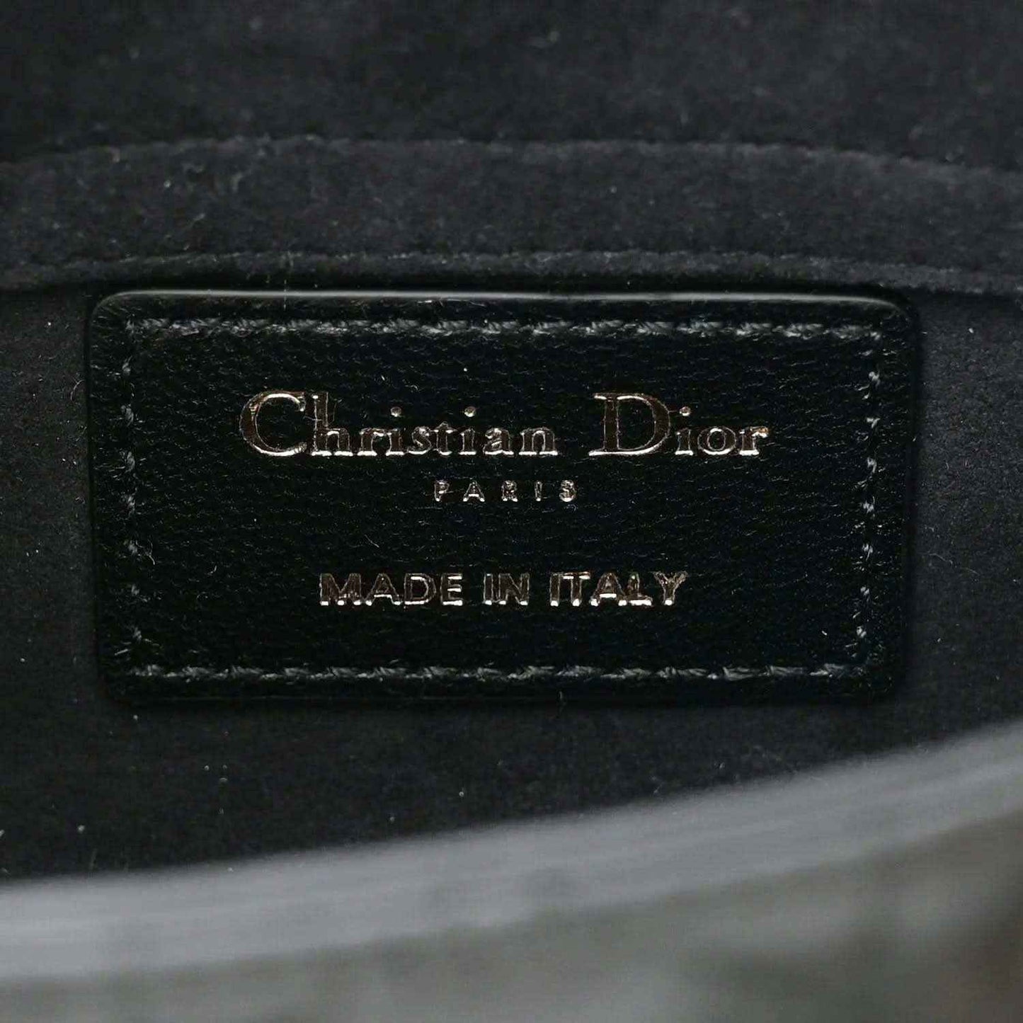 Christian Dior Paris leather logo patch inside handbag, 'Made in Italy' text