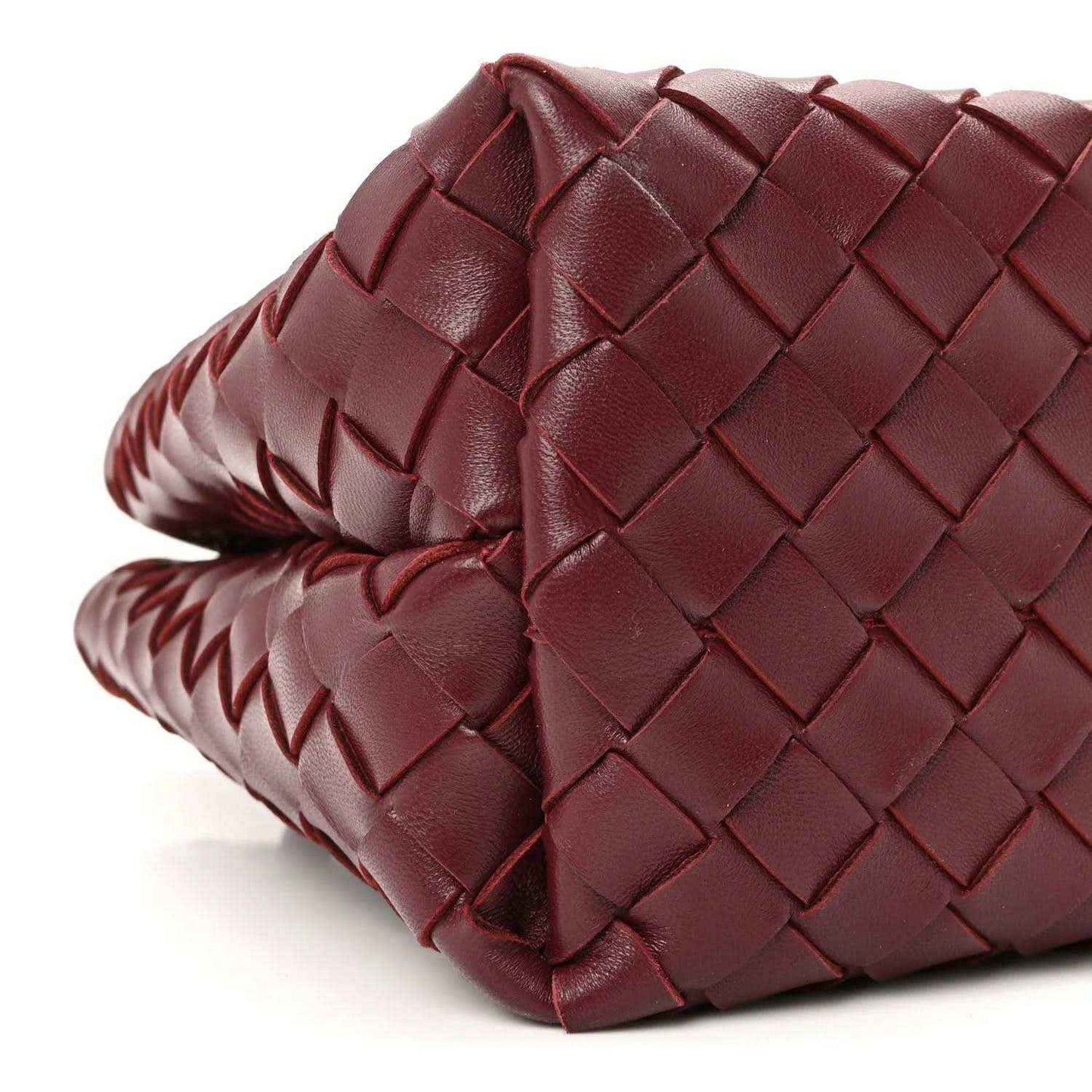 Burgundy intrecciato nappa leather bag, braided edge trim and side view.