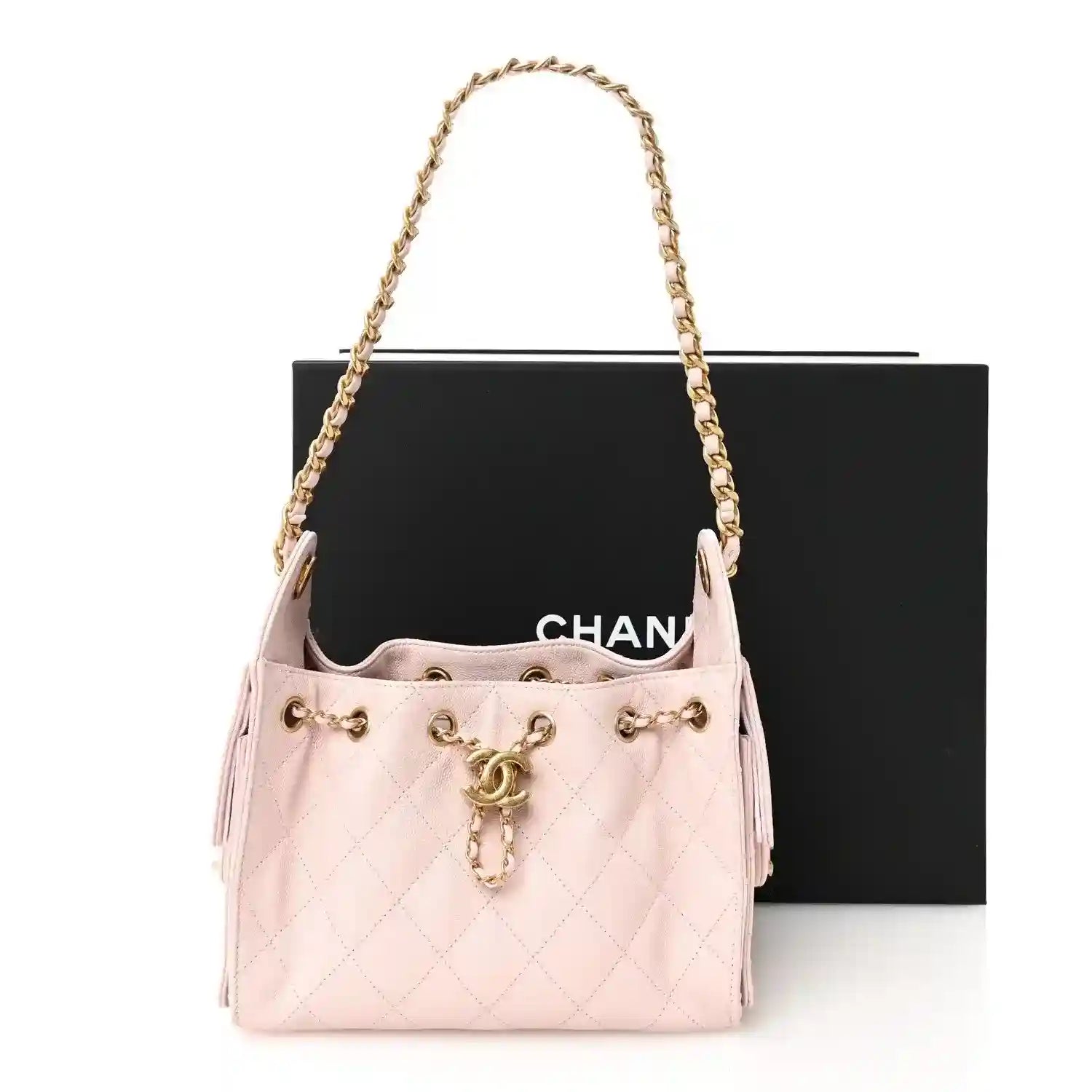 Light pink Chanel mini quilted leather handbag with shoulder chain and tassel pull