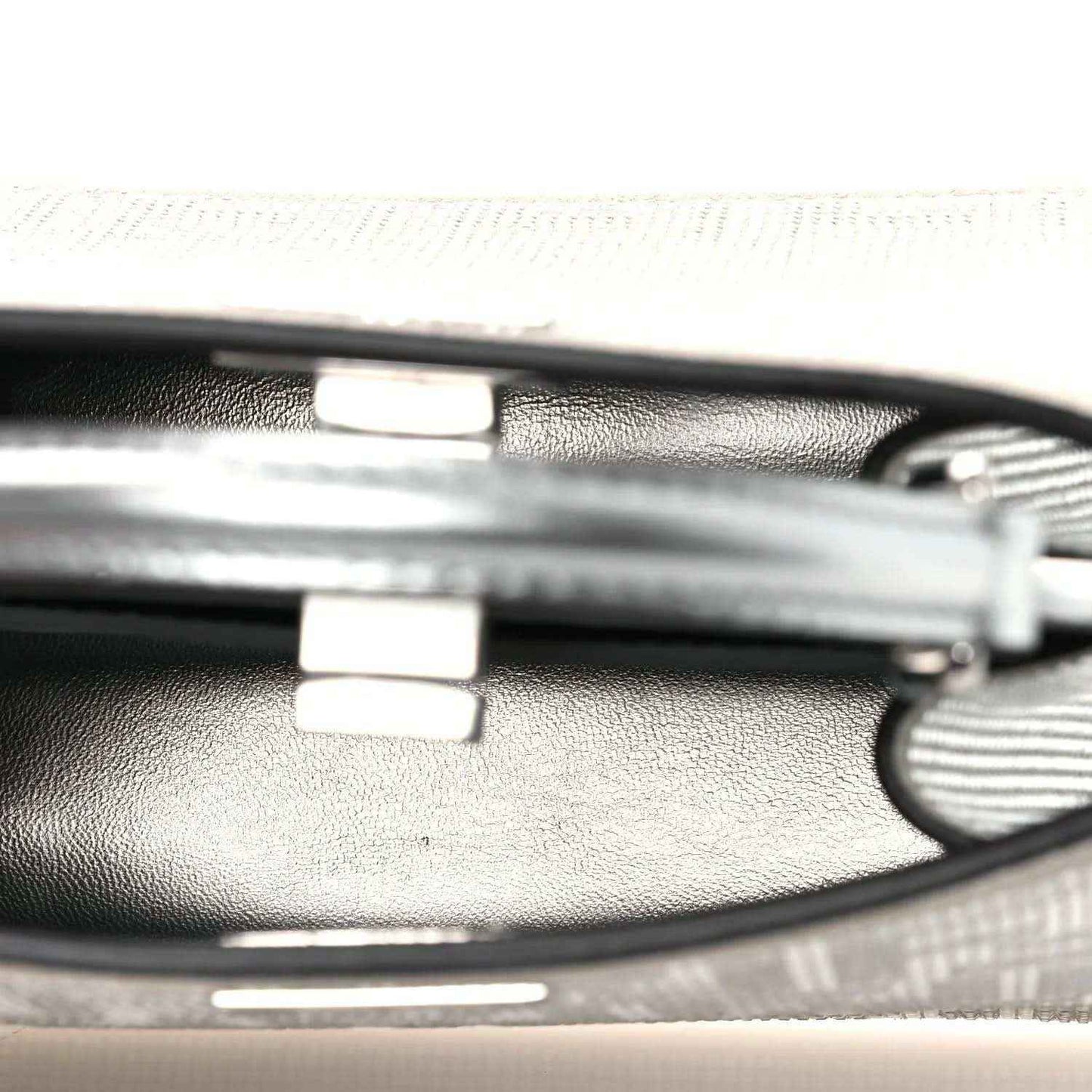Silver leather shoulder strap with metal buckle and adjustment bar