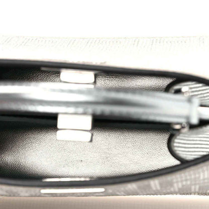 Silver leather shoulder strap with metal buckle and adjustment bar