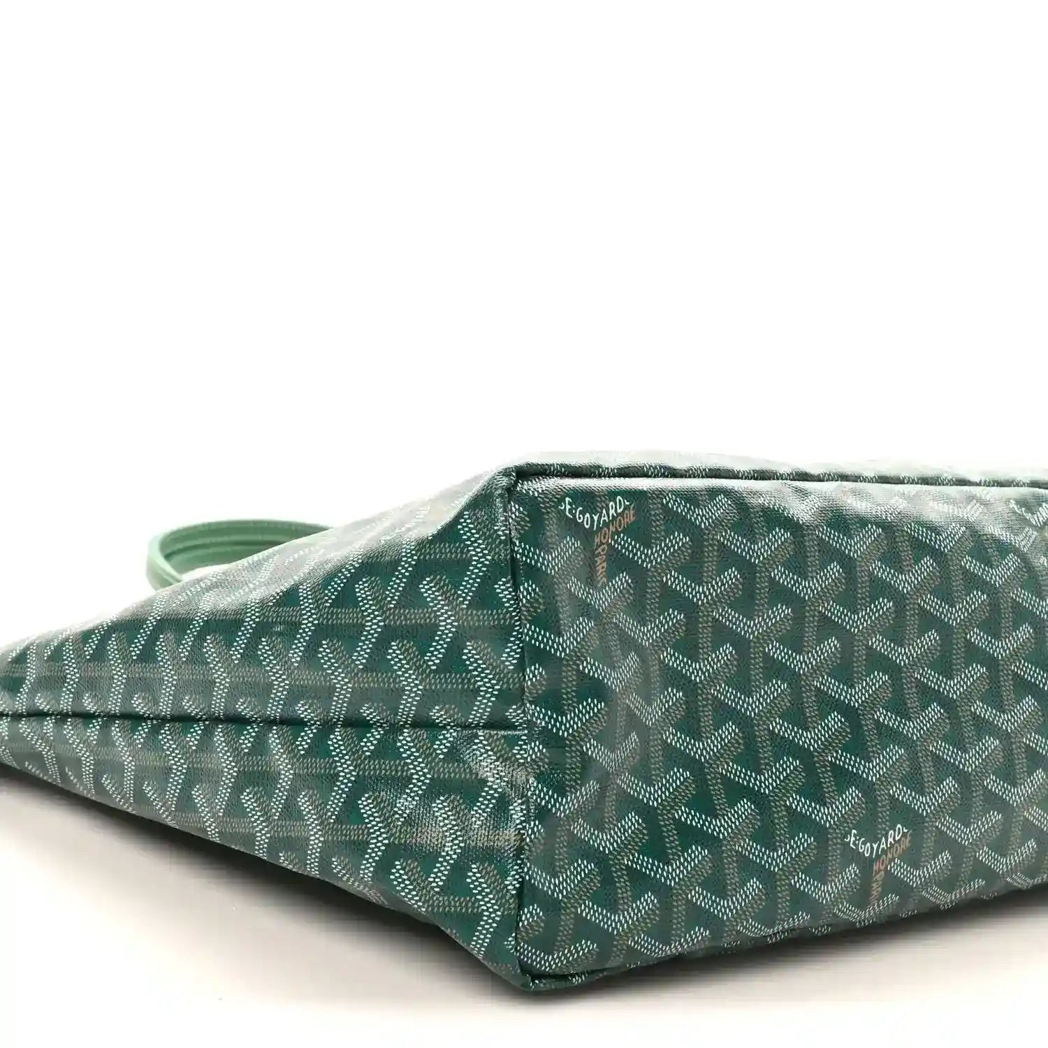 Green canvas tote bag corner view with Goyardine pattern and folded edge