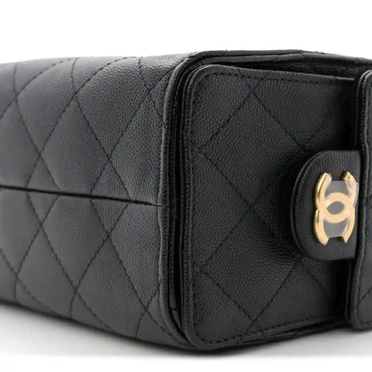 Black quilted mini handbag corner with flap closure and CC emblem hardware
