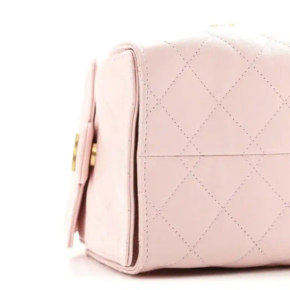 Chanel light pink quilted caviar small shoulder handbag side profile with strap