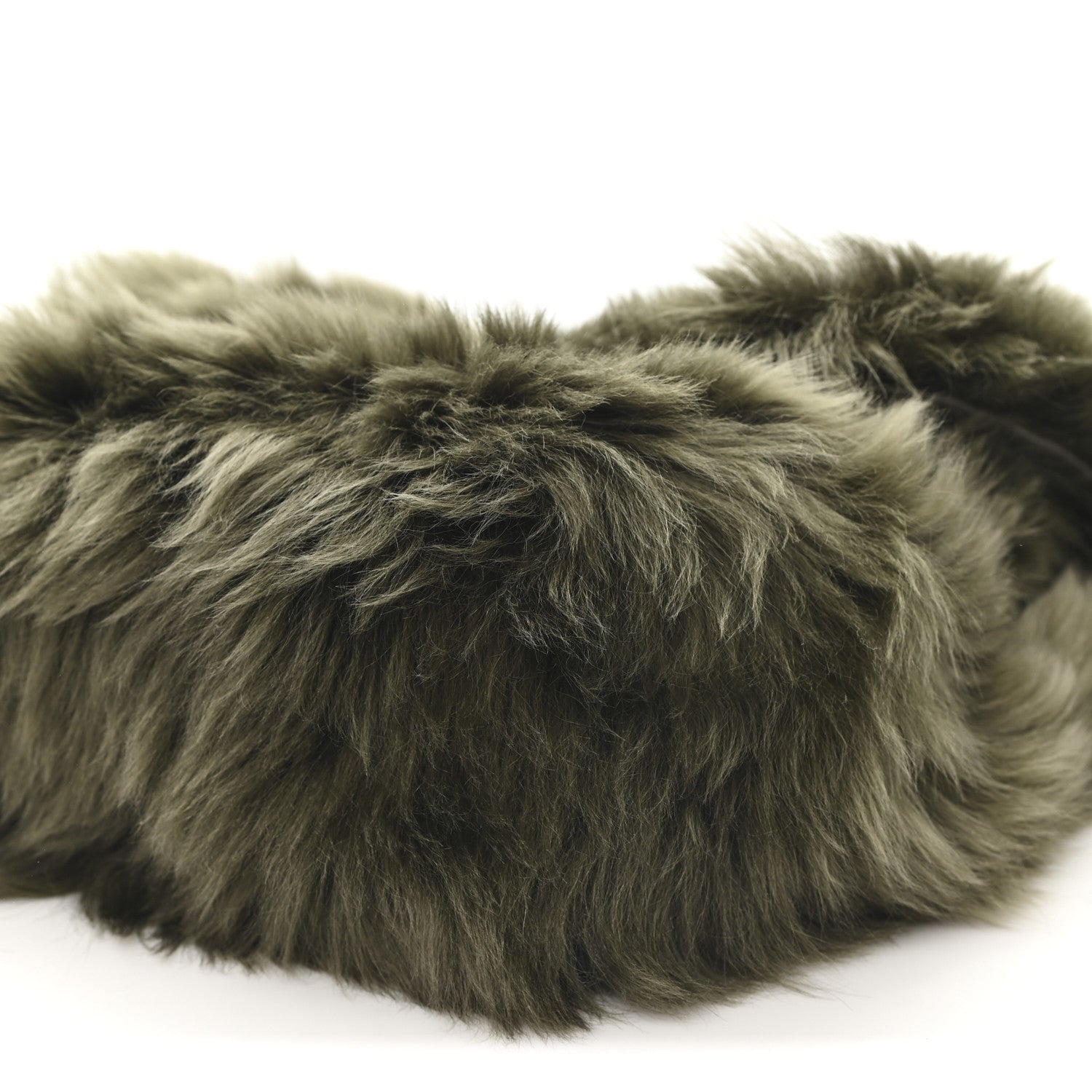 Dark olive shearling fur detail with layered pile texture and stitched edge