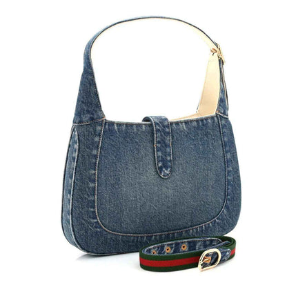 Blue denim Jackie shoulder bag with gold-tone clasp and red-green web strap