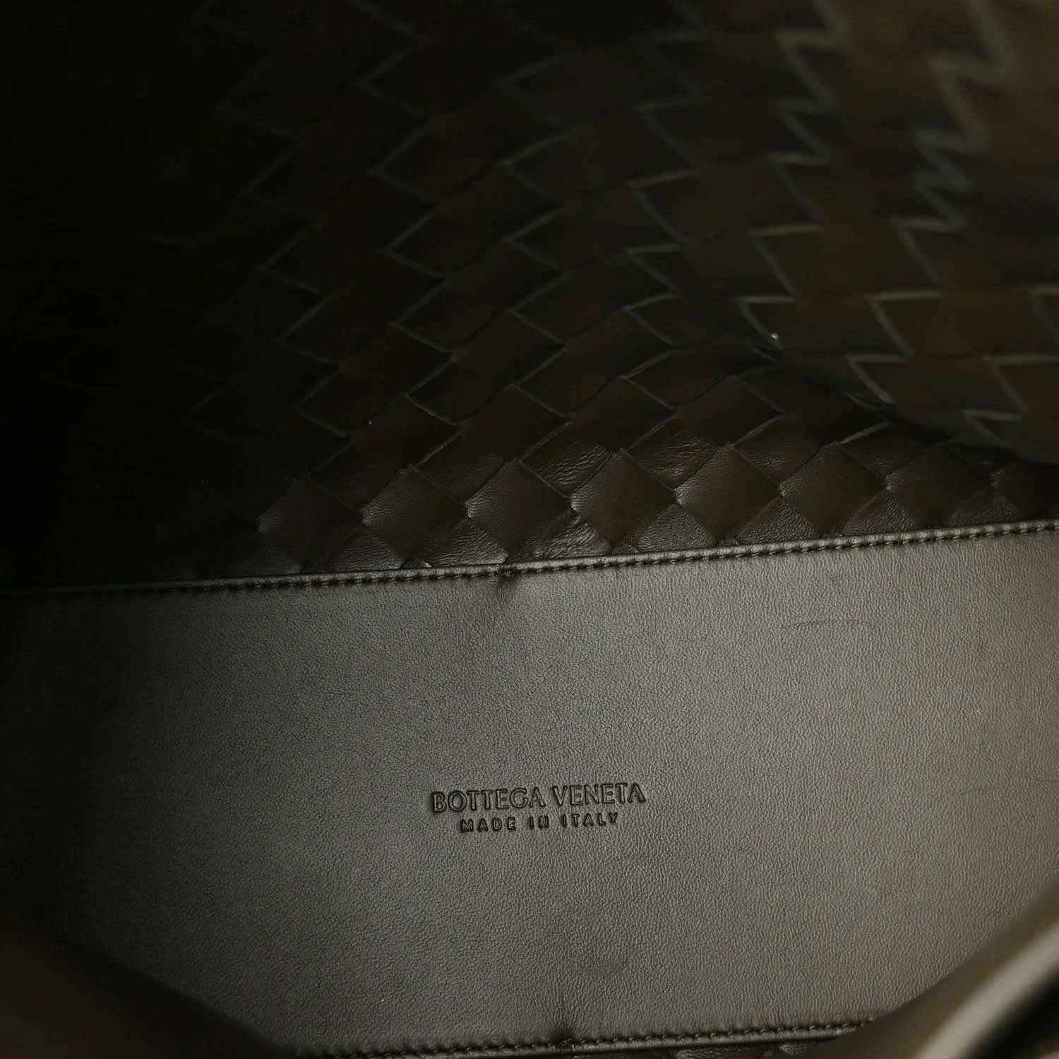 Bottega Veneta leather bag interior panel with embossed brand text