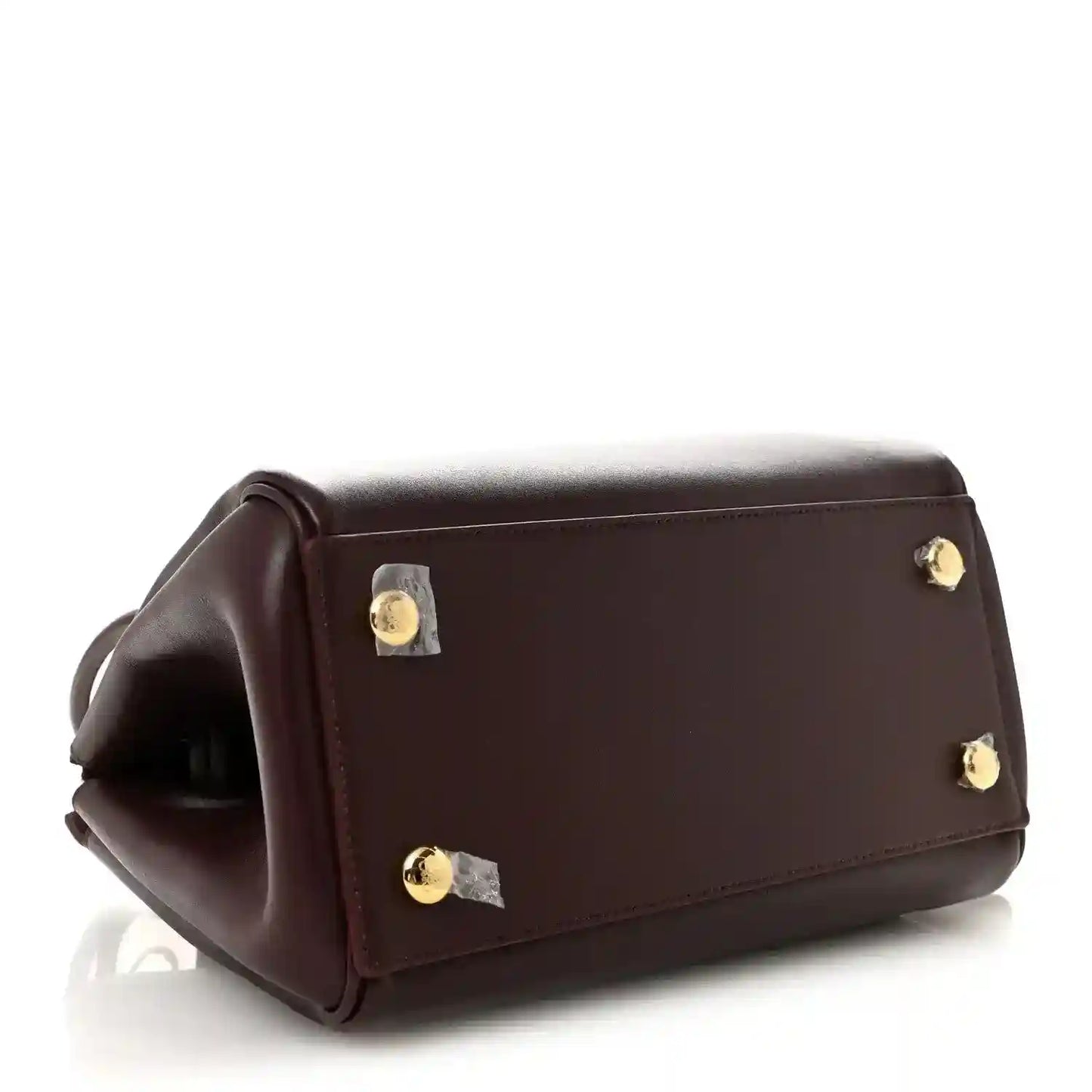 Loewe Small Madrid bag in dark burgundy calfskin with gold-tone hardware and flap pocket