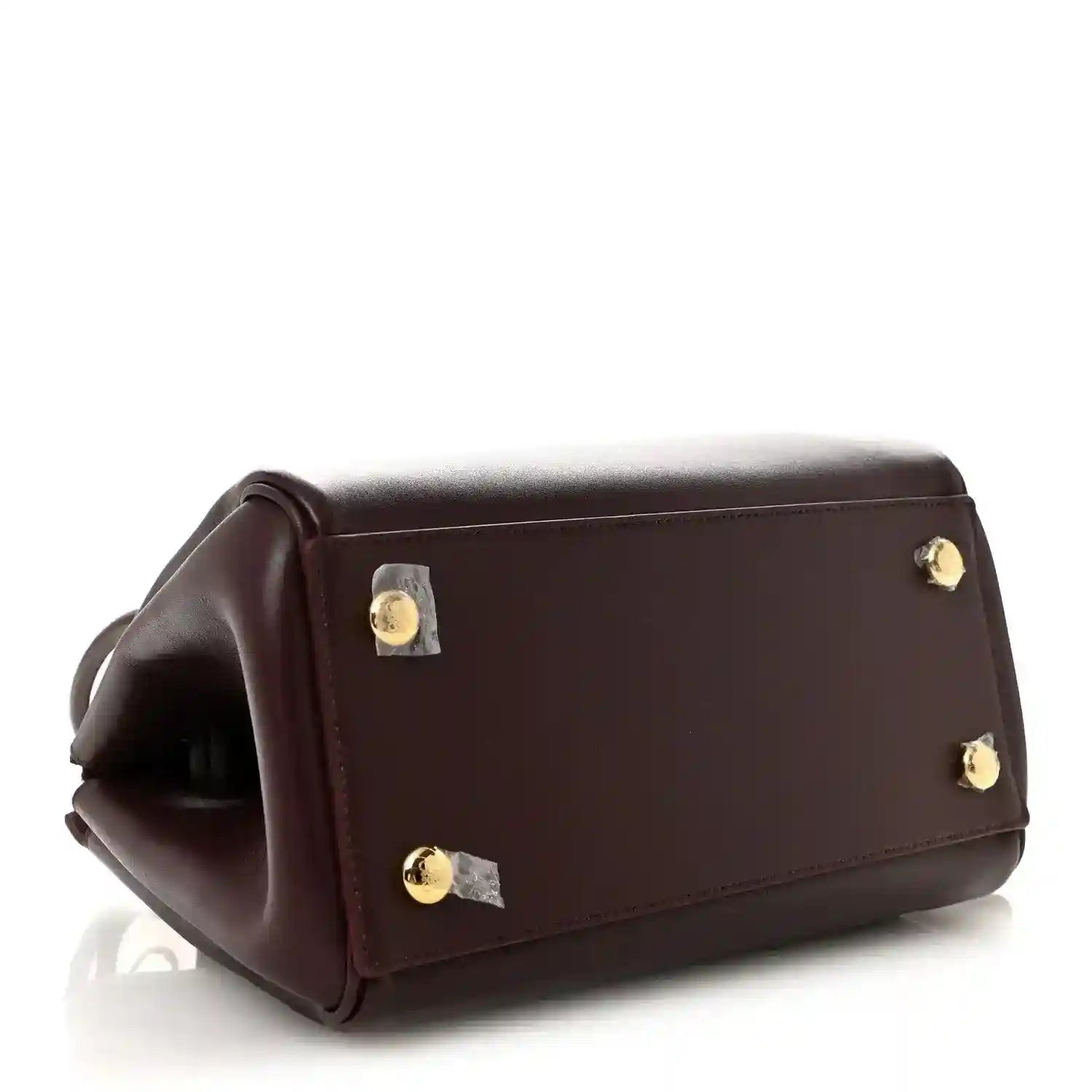 Loewe Small Madrid bag in dark burgundy calfskin with gold-tone hardware and flap pocket
