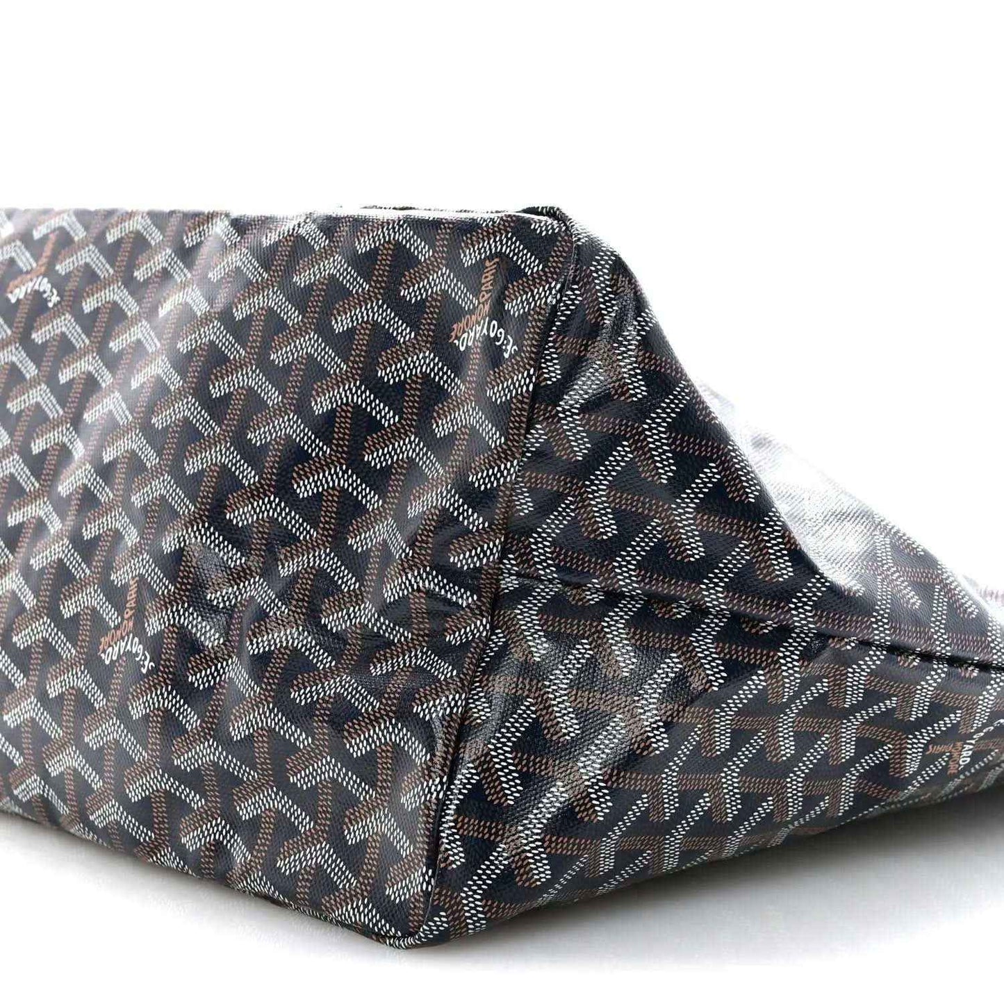 Navy patterned tote bag with Goyardine-style logo print and curved seams