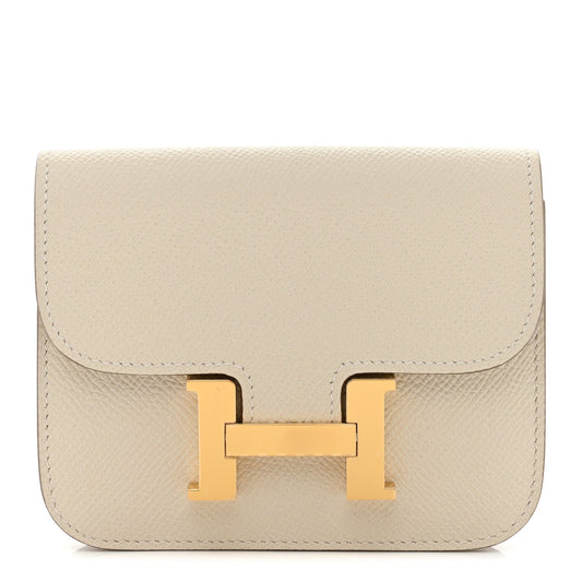 Slim wallet with flap and gold H clasp, light cream textured leather