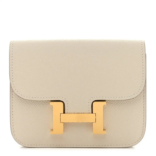Slim wallet with flap and gold H clasp, light cream textured leather