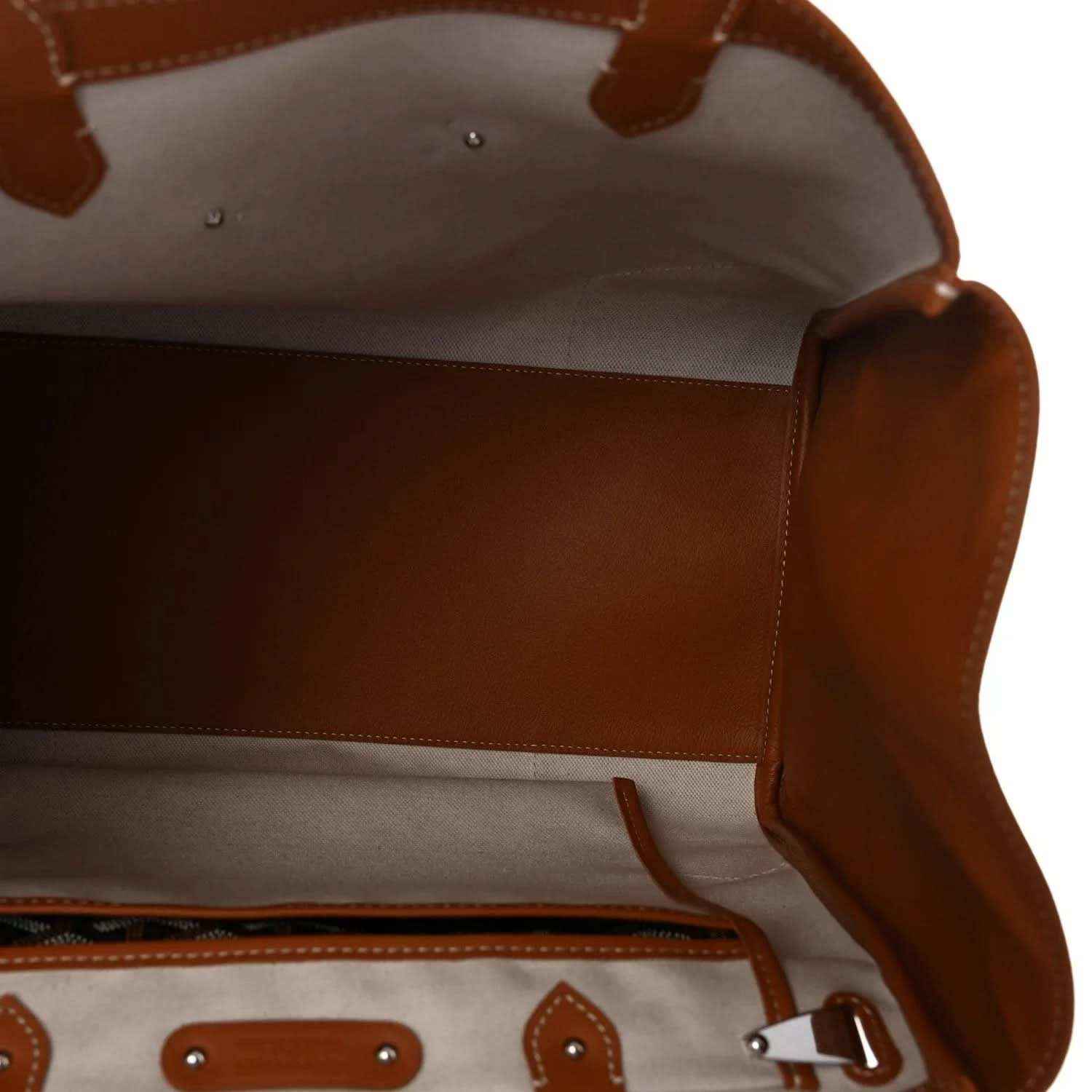 Goyard Saigon tote handbag interior view with brown leather sides and zipper pocket